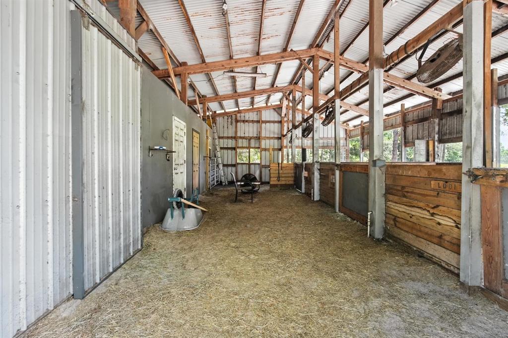 29933 Fullerville Road DeLand, FL 32720 - Photo 30 of 57 a view of an empty room with wooden walls