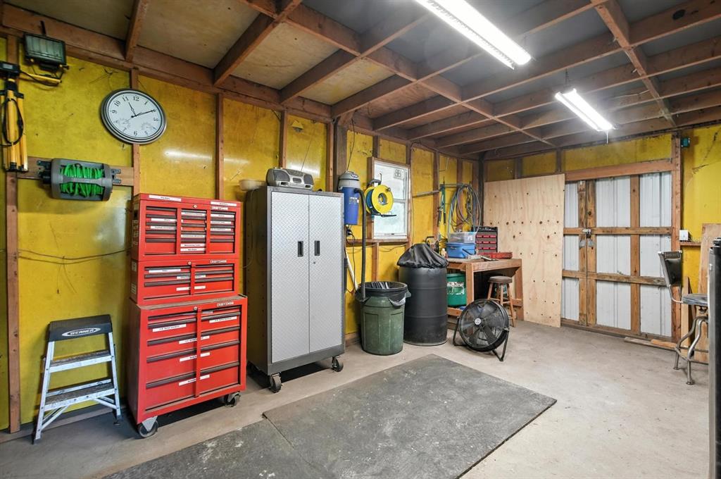 29933 Fullerville Road DeLand, FL 32720 - Photo 32 of 57 a view of storage and utility room with a lot of stuff