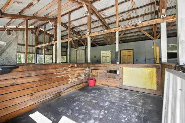 a side view of a house with a yard