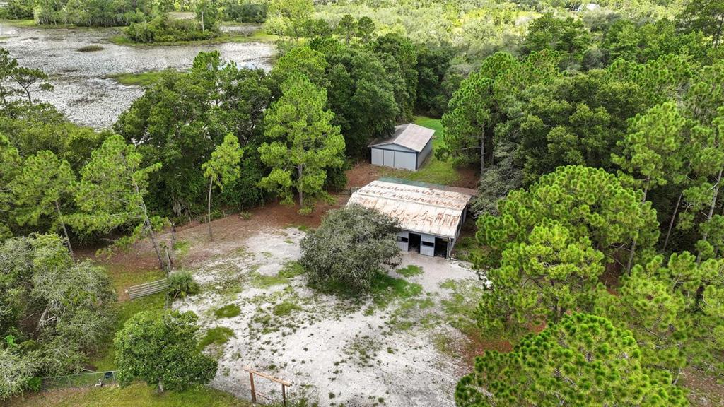 29933 Fullerville Road DeLand, FL 32720 - Photo 50 of 57 a view of a house with a yard and sitting area