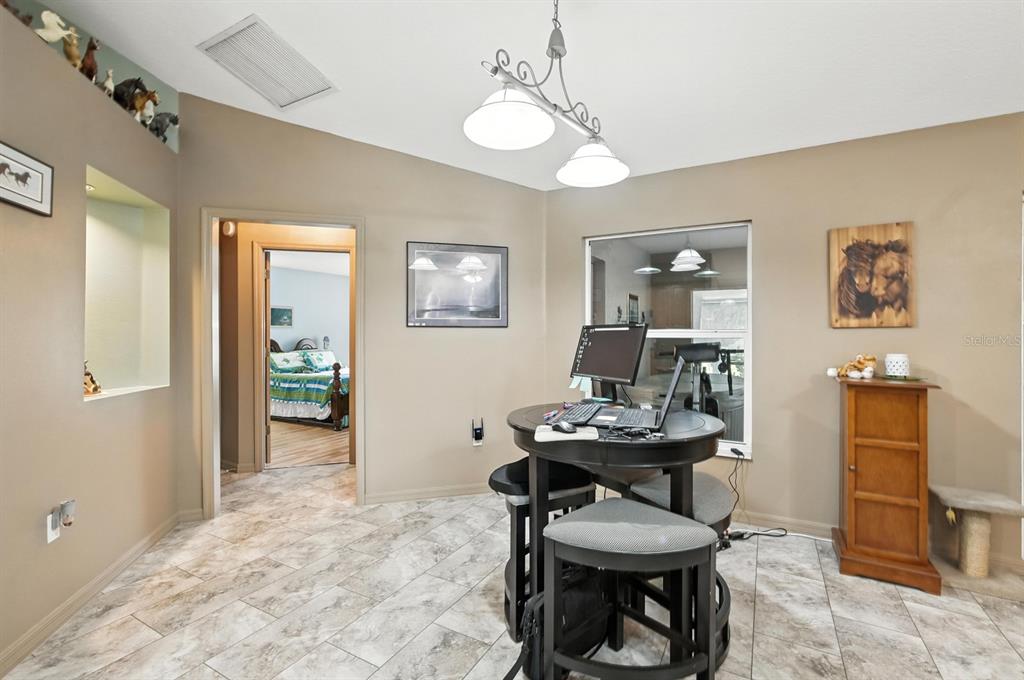 29933 Fullerville Road DeLand, FL 32720 - Photo 10 of 57 a workspace with furniture and window