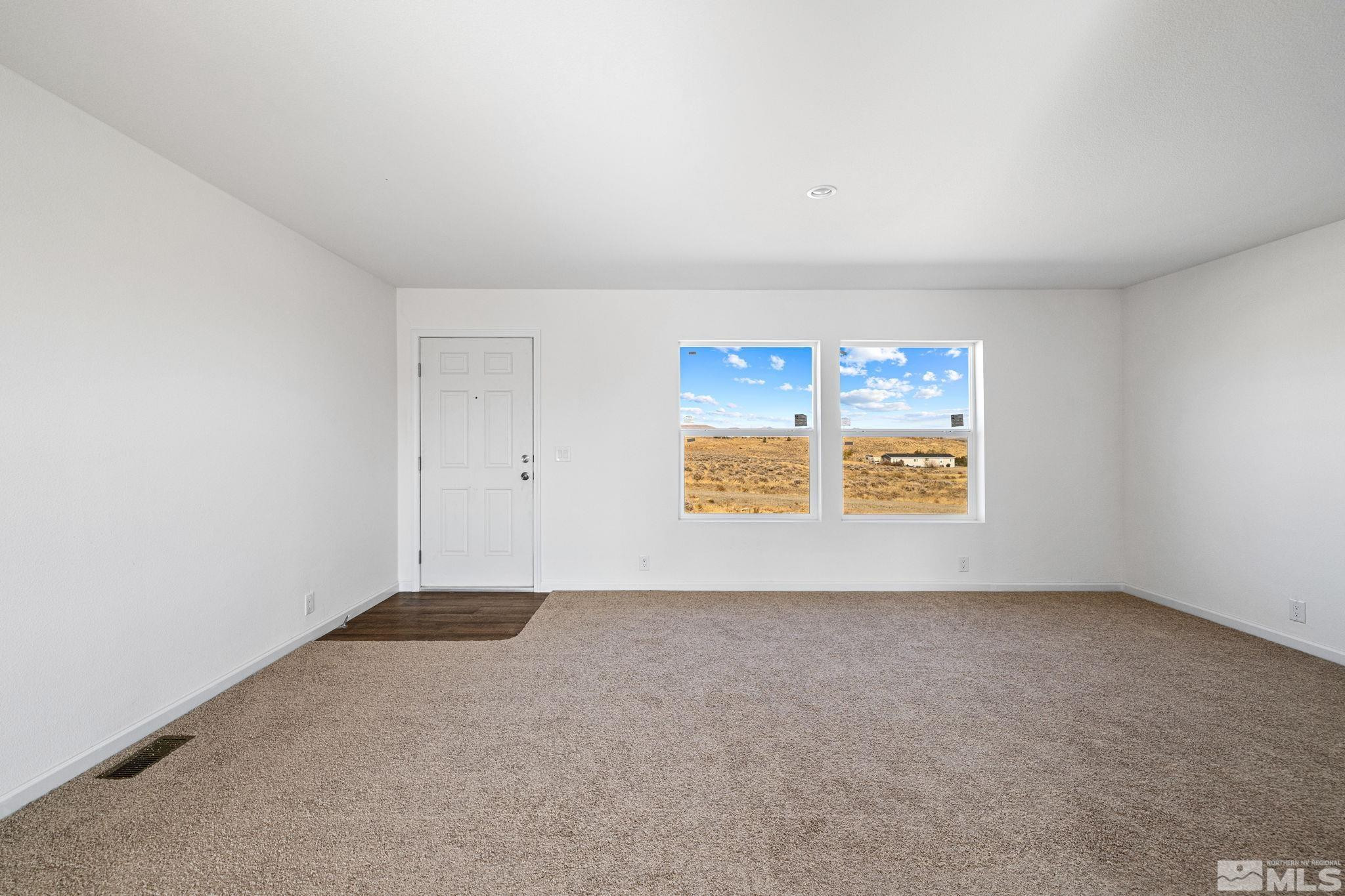 1435 East 8th Street Silver Springs, NV 89429 - Photo 13 of 30 an empty room with windows