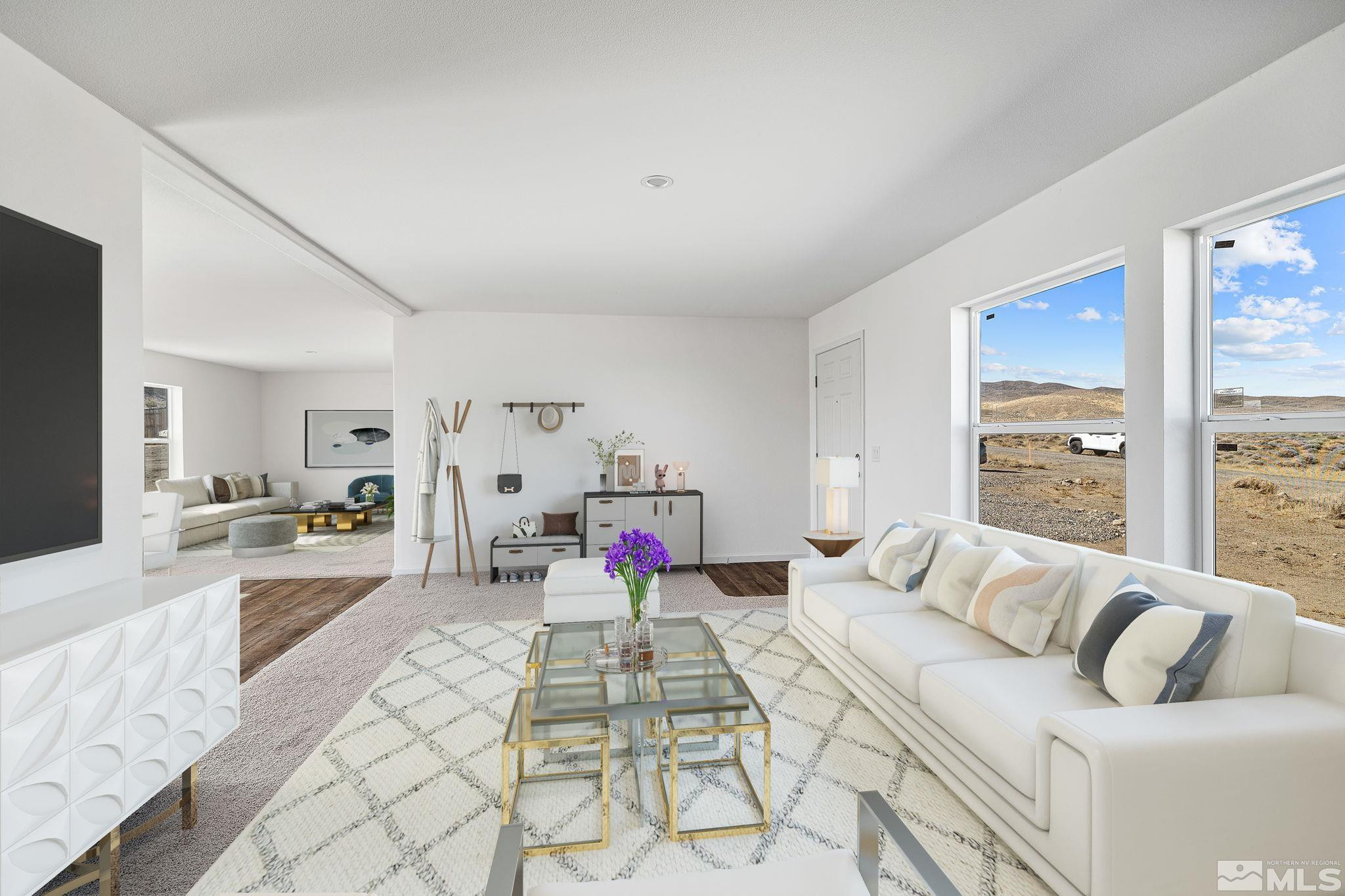 1435 East 8th Street Silver Springs, NV 89429 - Photo 15 of 30 a bedroom with furniture and a large window