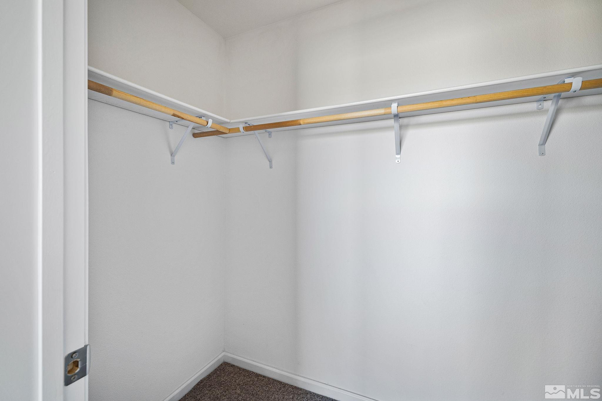 1435 East 8th Street Silver Springs, NV 89429 - Photo 22 of 30 a view of a room with racks on the wall