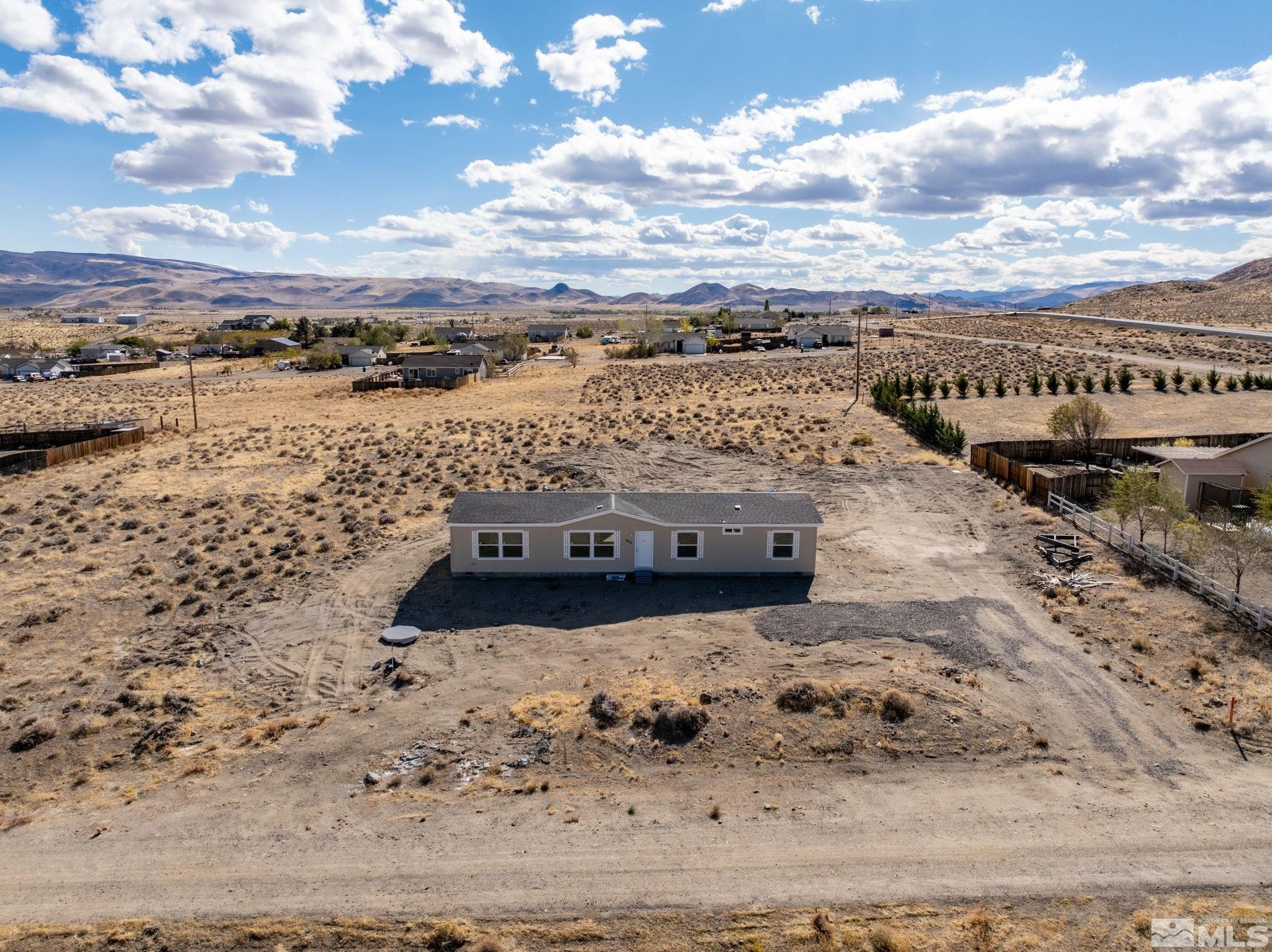 1435 East 8th Street Silver Springs, NV 89429 - Photo 3 of 30 a view of a ocean with beach