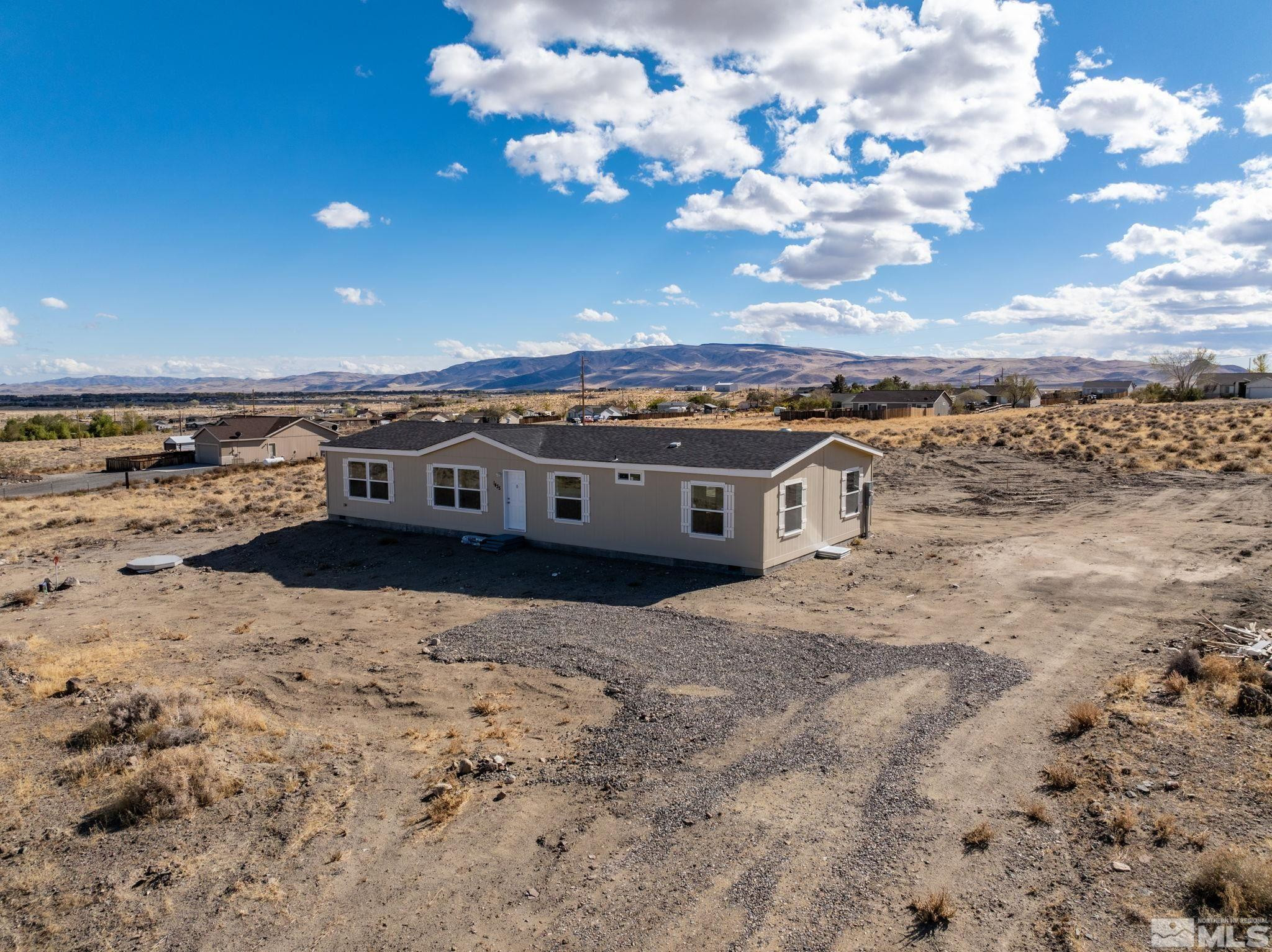 1435 East 8th Street Silver Springs, NV 89429 - Photo 6 of 30 a view of a terrace with a mountain