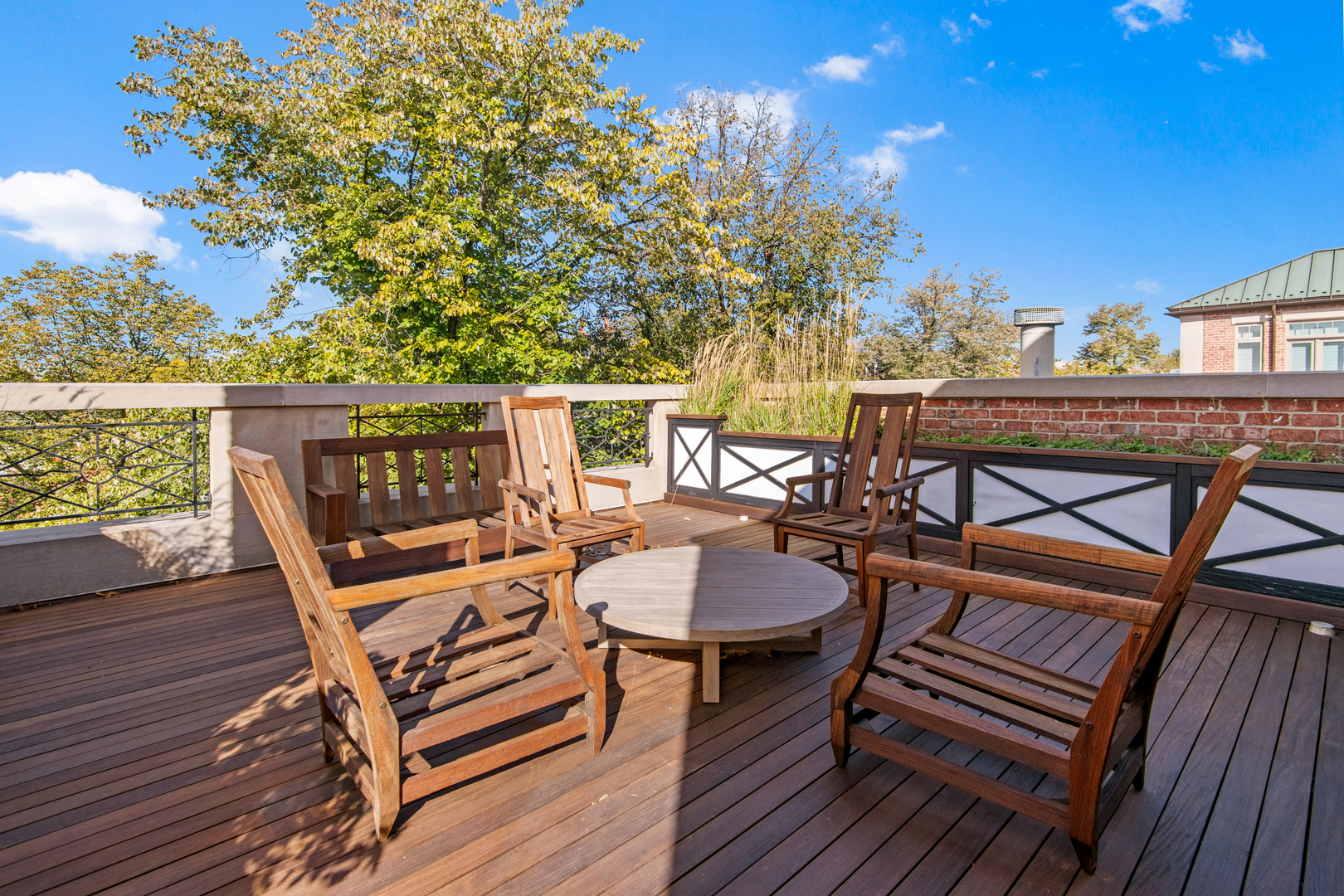 1921 North Mohawk Street Chicago, IL 60614 - Photo 28 of 44 a view of a balcony with furniture and wooden floor