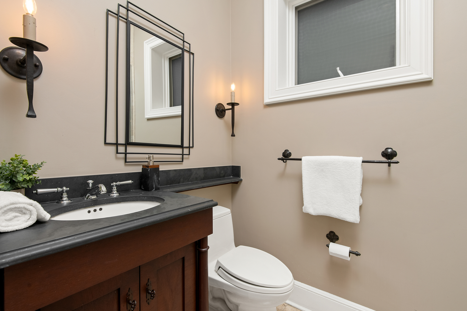 1921 North Mohawk Street Chicago, IL 60614 - Photo 35 of 44 a bathroom with a sink vanity mirror and toilet