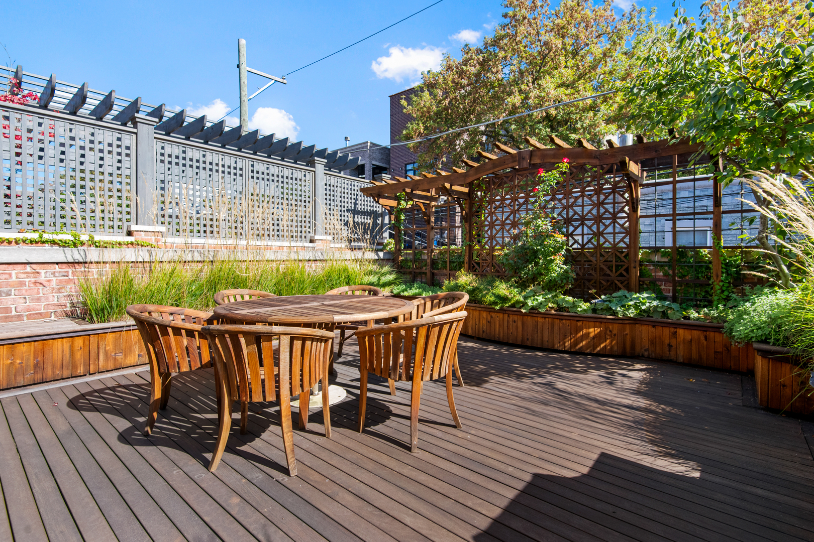 1921 North Mohawk Street Chicago, IL 60614 - Photo 38 of 44 a view of a chairs and table on the wooden deck