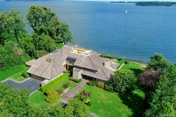 an aerial view of a house with a garden
