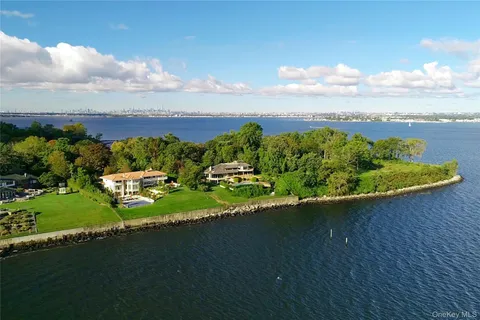 a view of a lake with a big yard