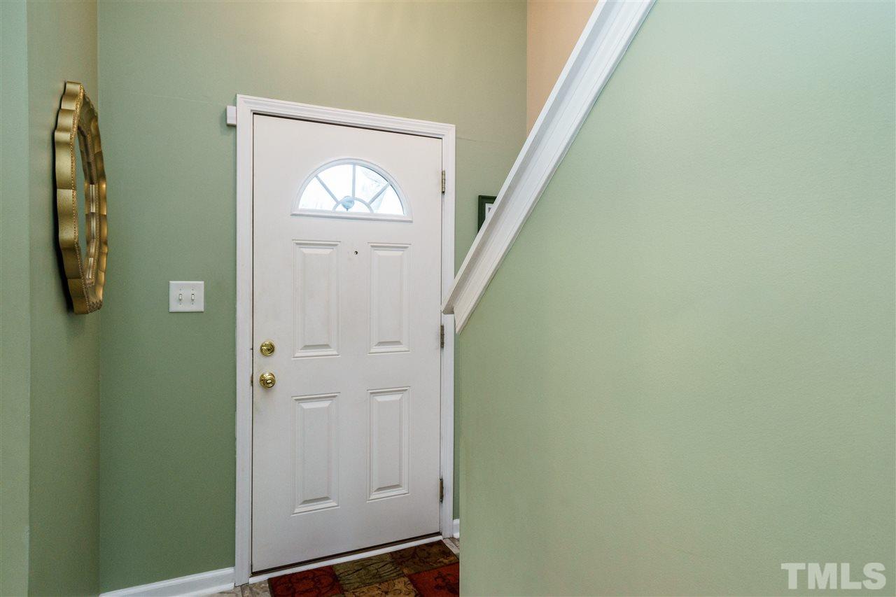 3809 Tyler Bluff Lane Raleigh, NC 27616 - Photo 4 of 25 a view of front door with stairs