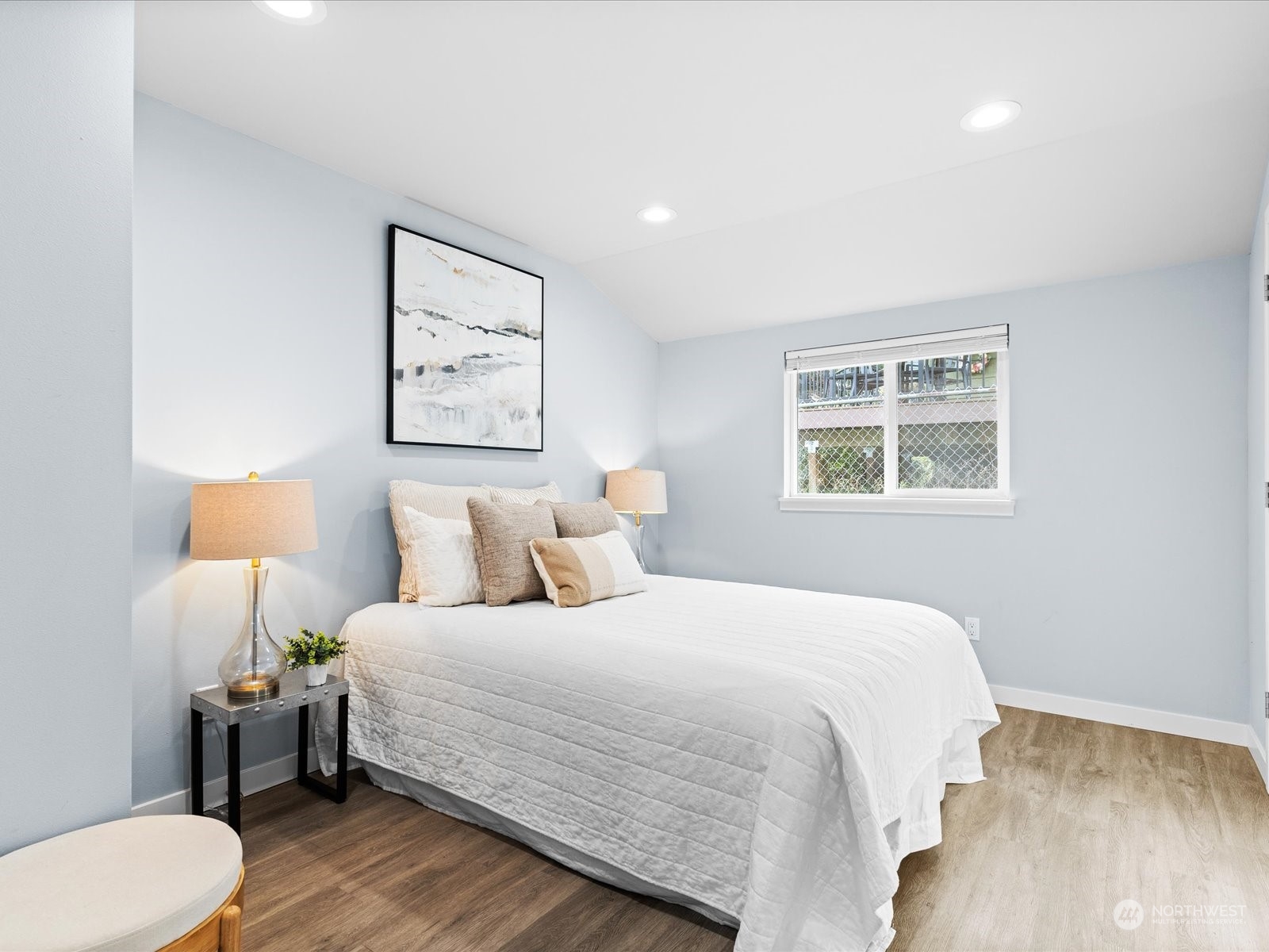 5514 Lowell Road Everett, WA 98203 - Photo 13 of 26 a bedroom with bed and a night stand