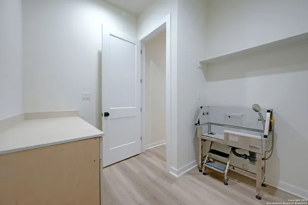 a room that has a bed and a chair in it