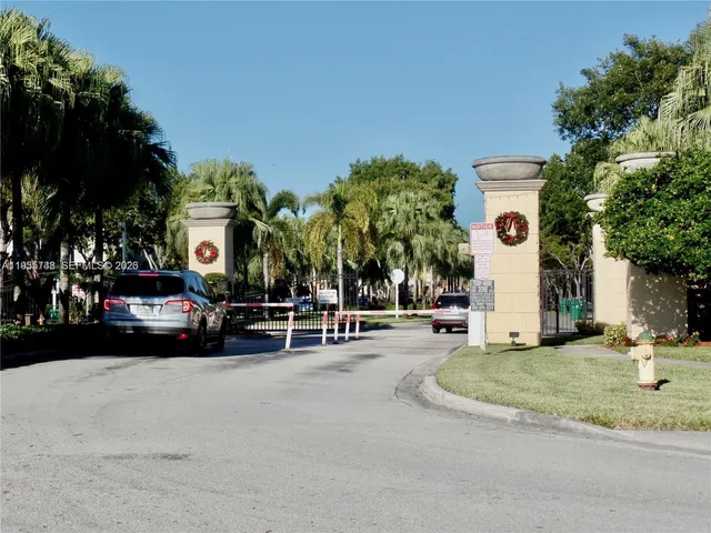 a view of a parked cars in front of a building