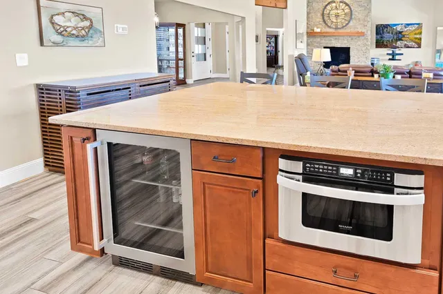 a kitchen with a stove and a microwave