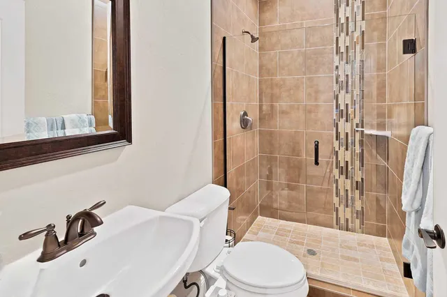 a bedroom with two beds and a window