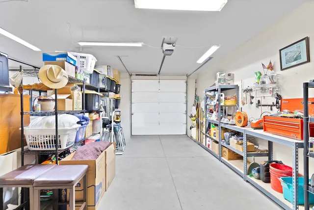 a view of a room with furniture window and wooden floor