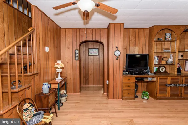 a kitchen with stainless steel appliances granite countertop a refrigerator and a stove