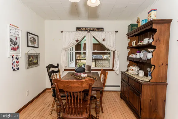 a bedroom with a bed and a book shelf