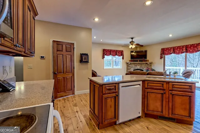 a bathroom with a sink a vanity and a mirror
