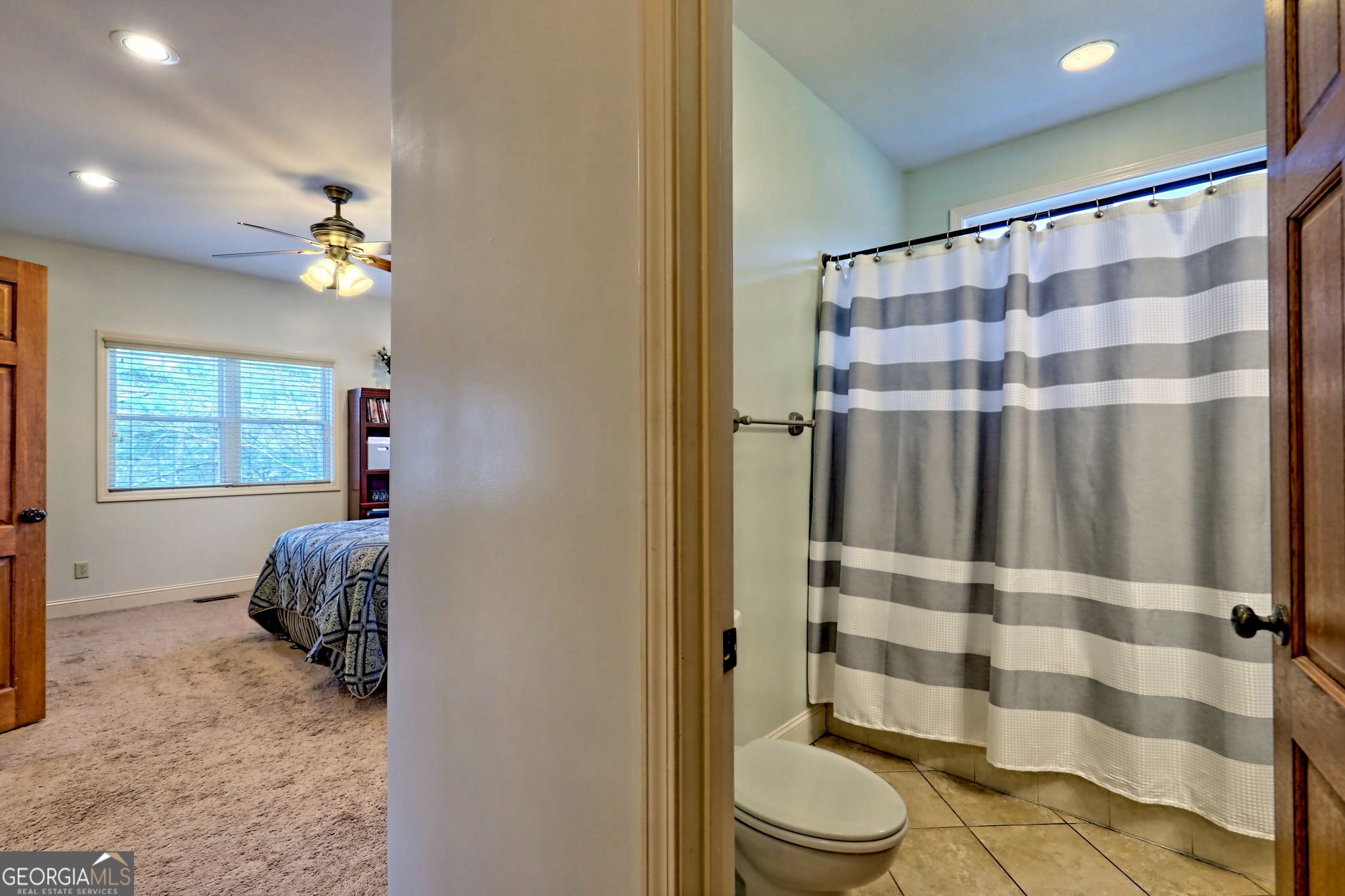 1068 Coleman River Road Clayton, GA 30525 - Photo 34 of 86 a bedroom with a bed and a window