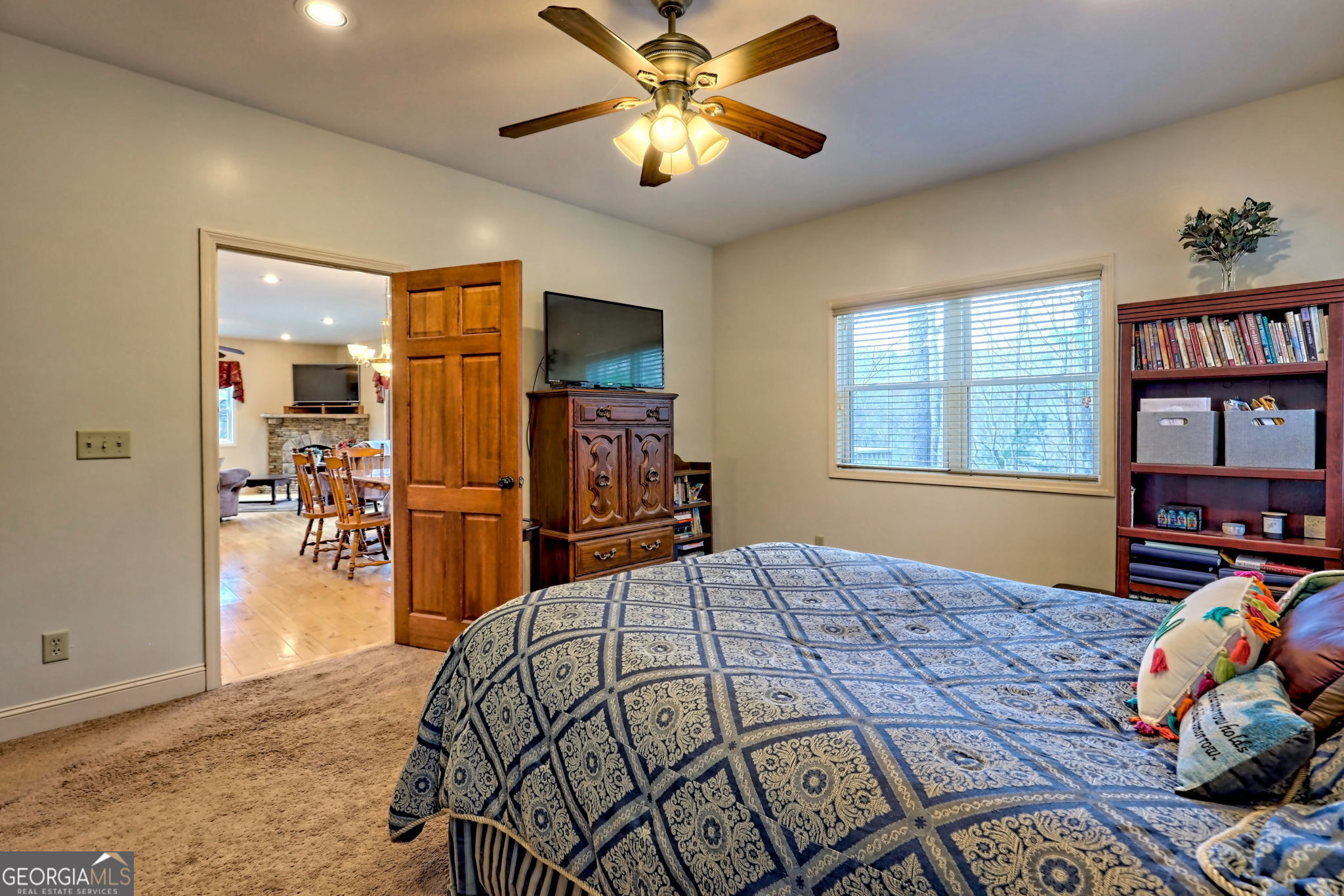 1068 Coleman River Road Clayton, GA 30525 - Photo 40 of 90 a bedroom with a bed and a chandelier