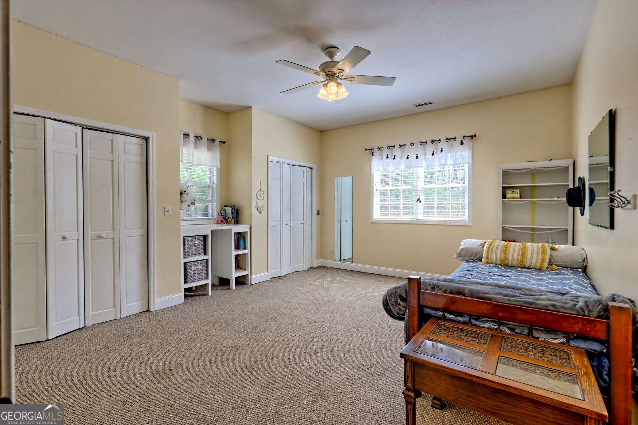 1068 Coleman River Road Clayton, GA 30525 - Photo 47 of 90 a living room with furniture and a flat screen tv
