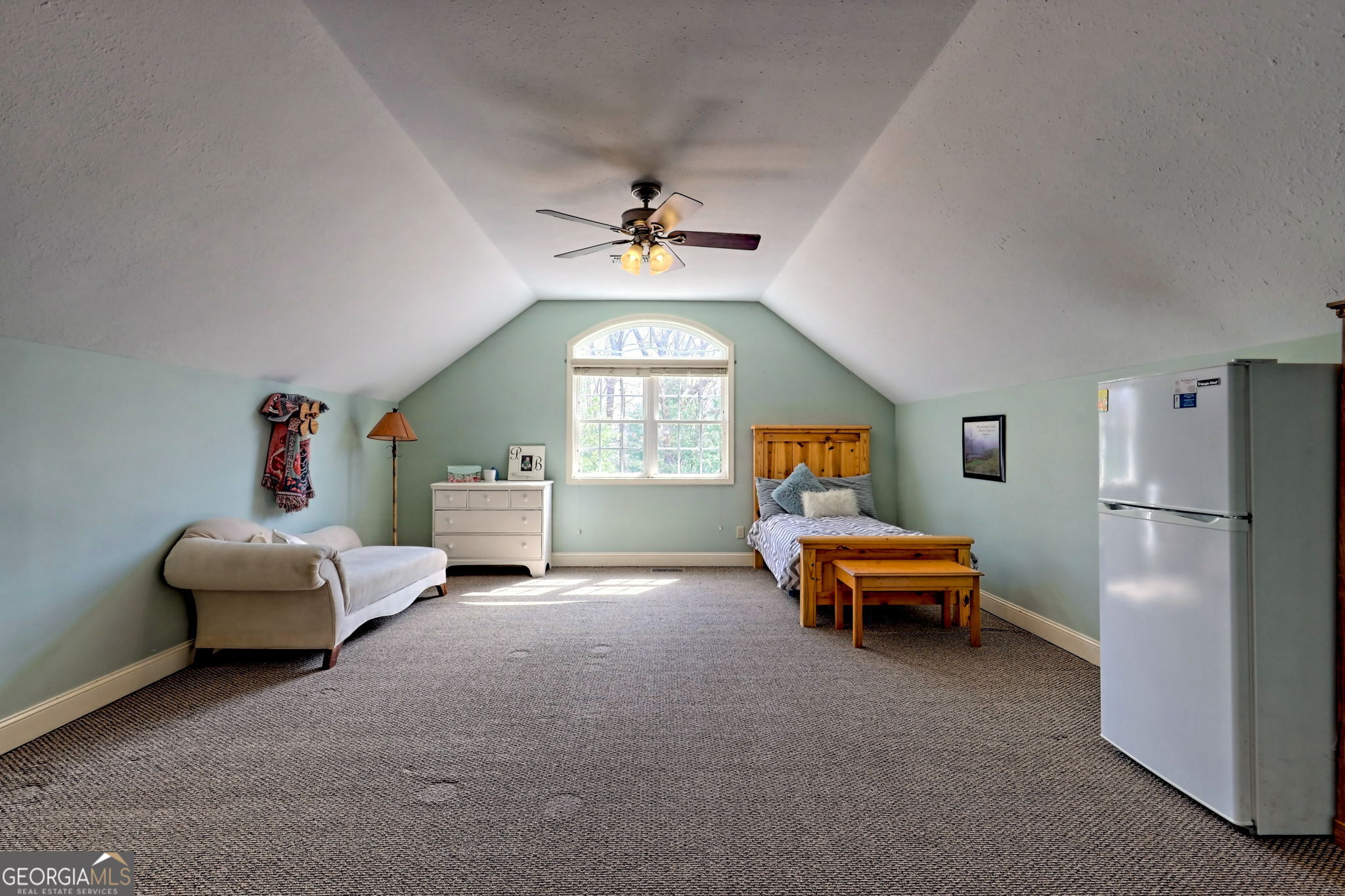 1068 Coleman River Road Clayton, GA 30525 - Photo 57 of 90 a living room with furniture and a chandelier