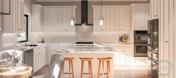 a kitchen with stainless steel appliances granite countertop a stove a sink and white cabinets with wooden floor
