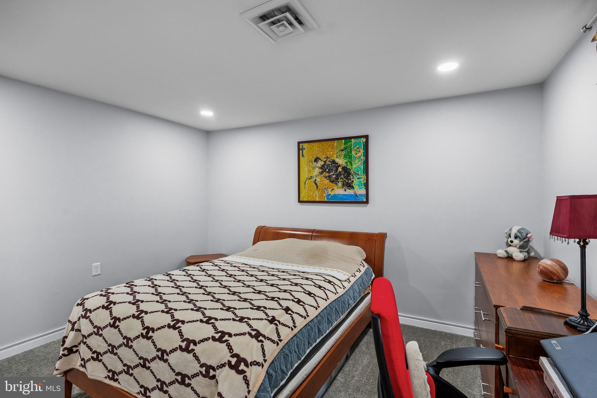 7 Picardy Place Southampton, NJ 08088 - Photo 17 of 26 a bedroom with a bed and painting on the wall