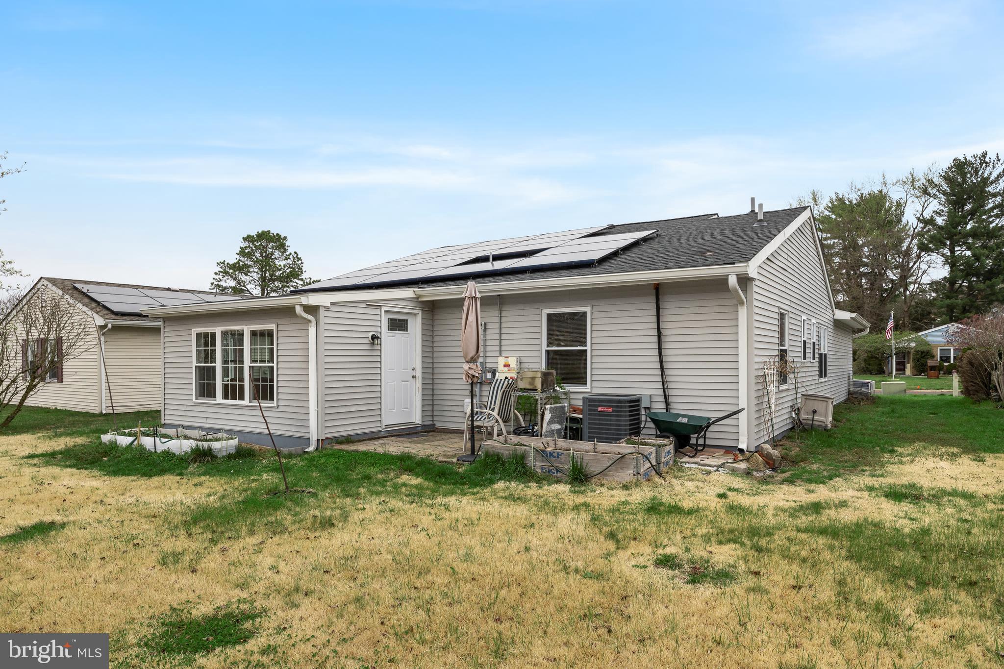 7 Picardy Place Southampton, NJ 08088 - Photo 23 of 26 a view of a house with backyard and sitting area