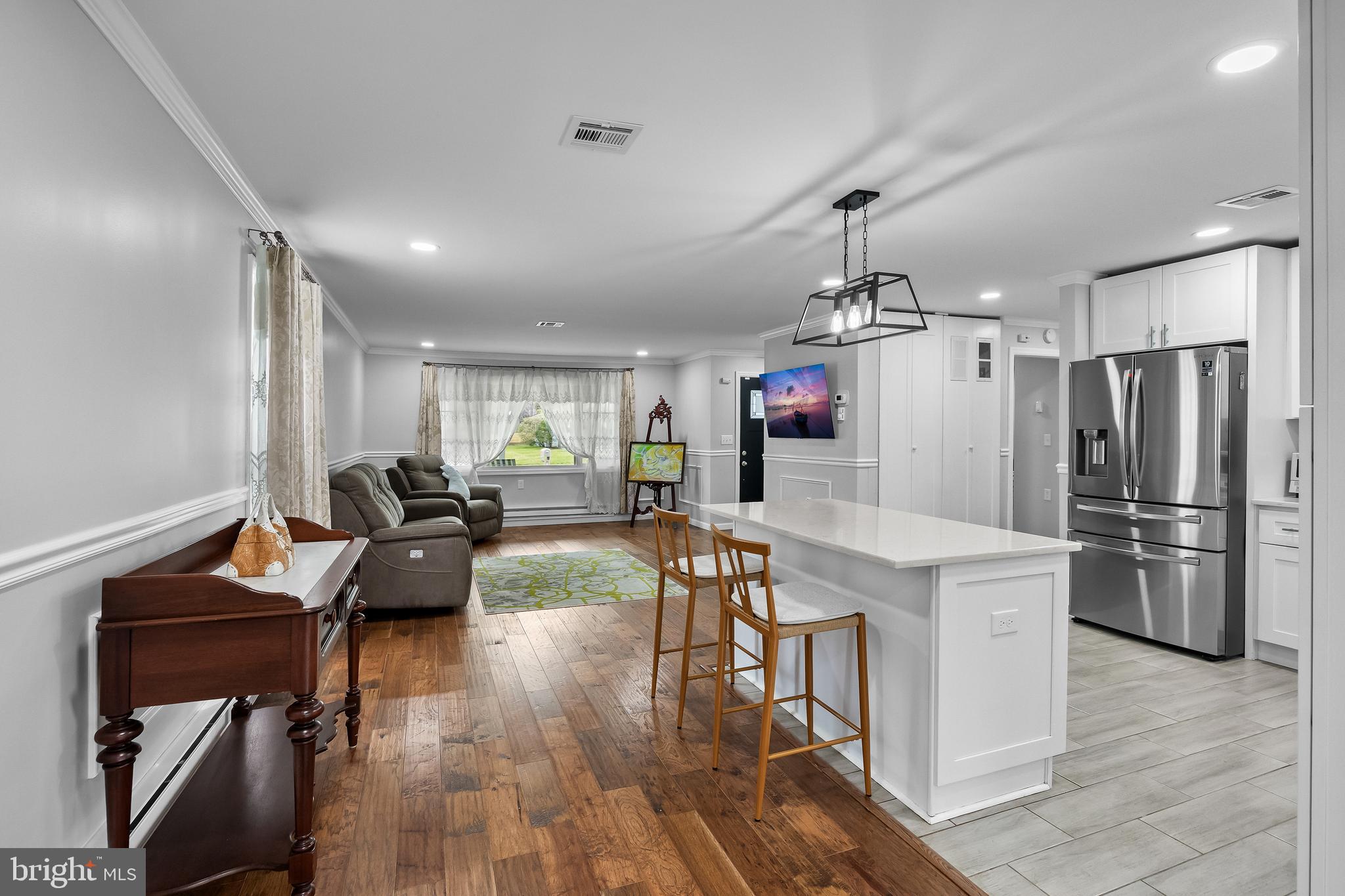 7 Picardy Place Southampton, NJ 08088 - Photo 5 of 26 a living room with furniture wooden floor and a kitchen view