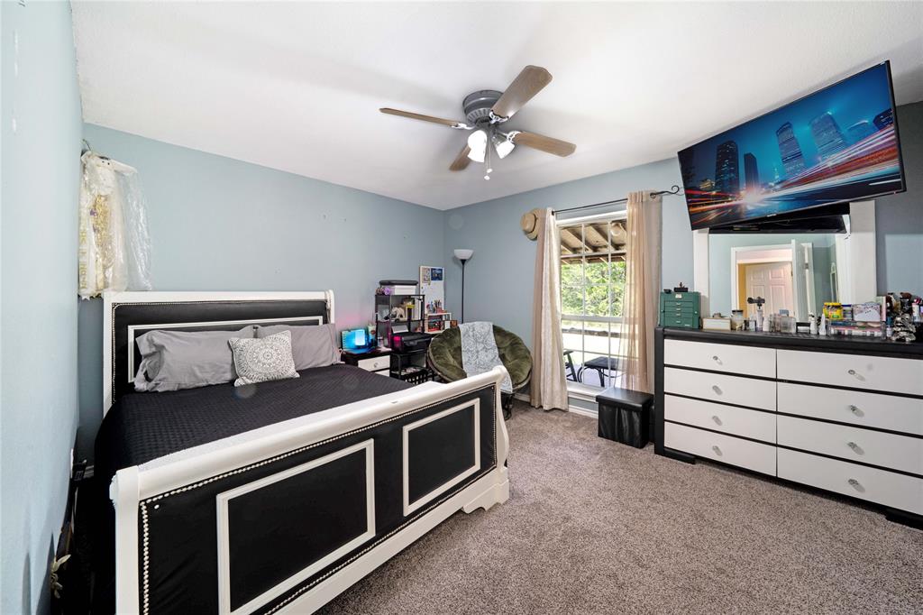 1511 North Walnut Grove Road Midlothian, TX 76065 - Photo 23 of 39 a bed room with a bed and a window
