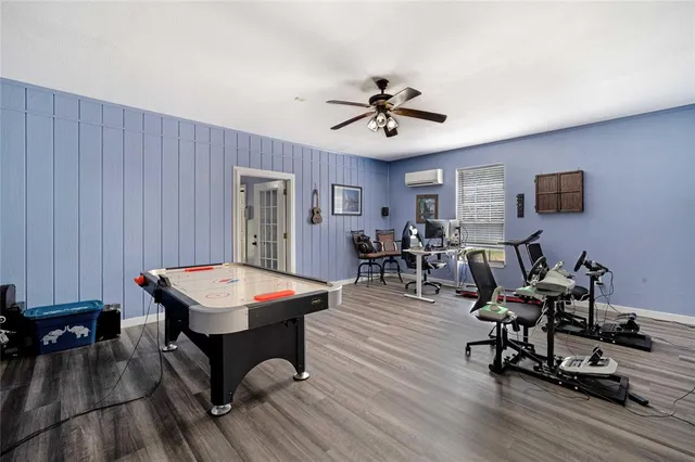 a view of a livingroom with furniture and wooden floor