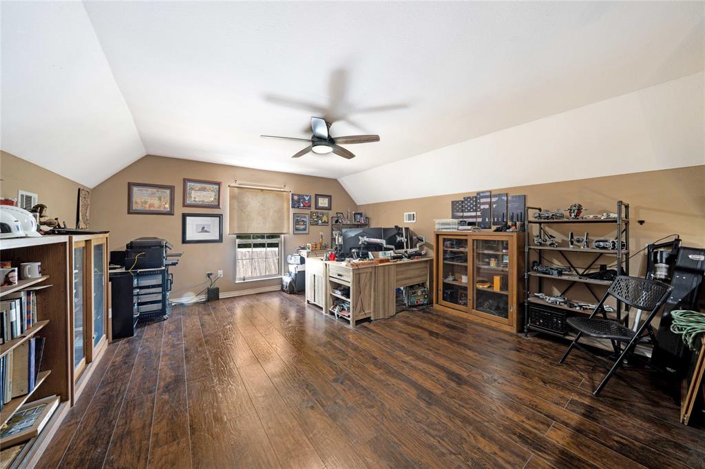 1511 North Walnut Grove Road Midlothian, TX 76065 - Photo 27 of 39 a view of a room with furniture and wooden floor
