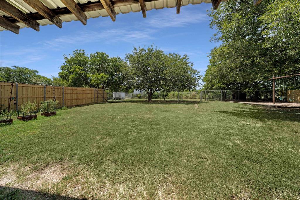 1511 North Walnut Grove Road Midlothian, TX 76065 - Photo 29 of 39 a view of a backyard