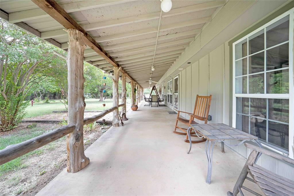 1511 North Walnut Grove Road Midlothian, TX 76065 - Photo 5 of 39 a view of a room with gym equipment