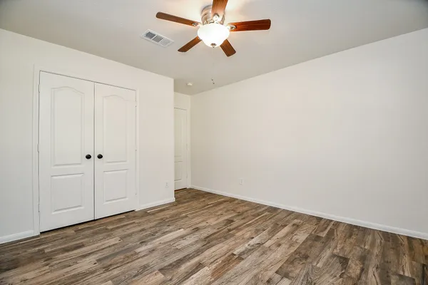 a view of small space with wooden floor