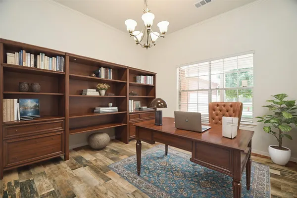a workspace with wooden floor