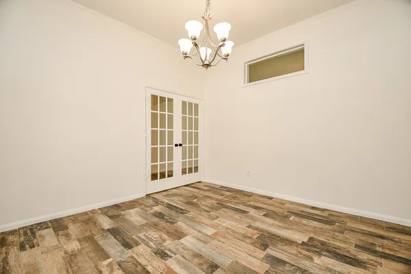 a view of a bedroom with a window