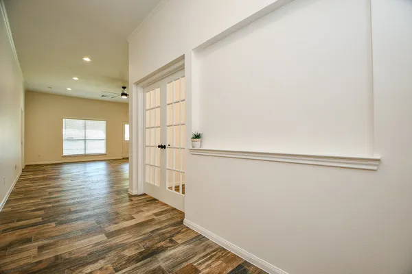 a view of a livingroom with wooden floor