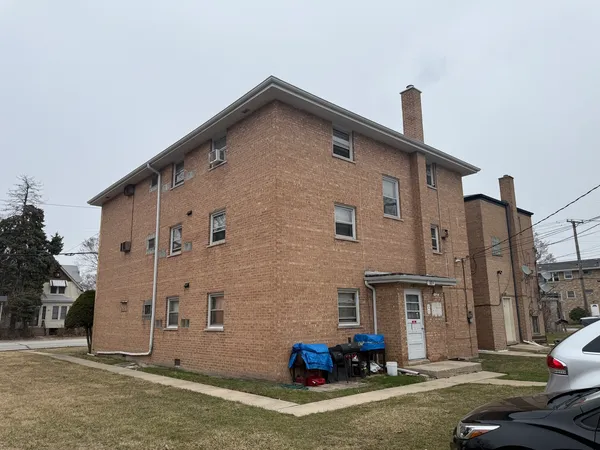 a view of multiple house with a street