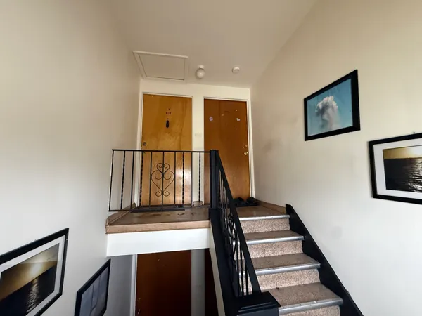 a view of entryway with wooden floor