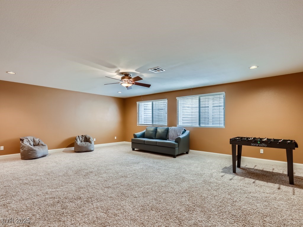 1221 Fragrant Spruce Avenue Las Vegas, NV 89123 - Photo 45 of 59 Basement featuring carpet, recessed lighting and ceiling fan with light