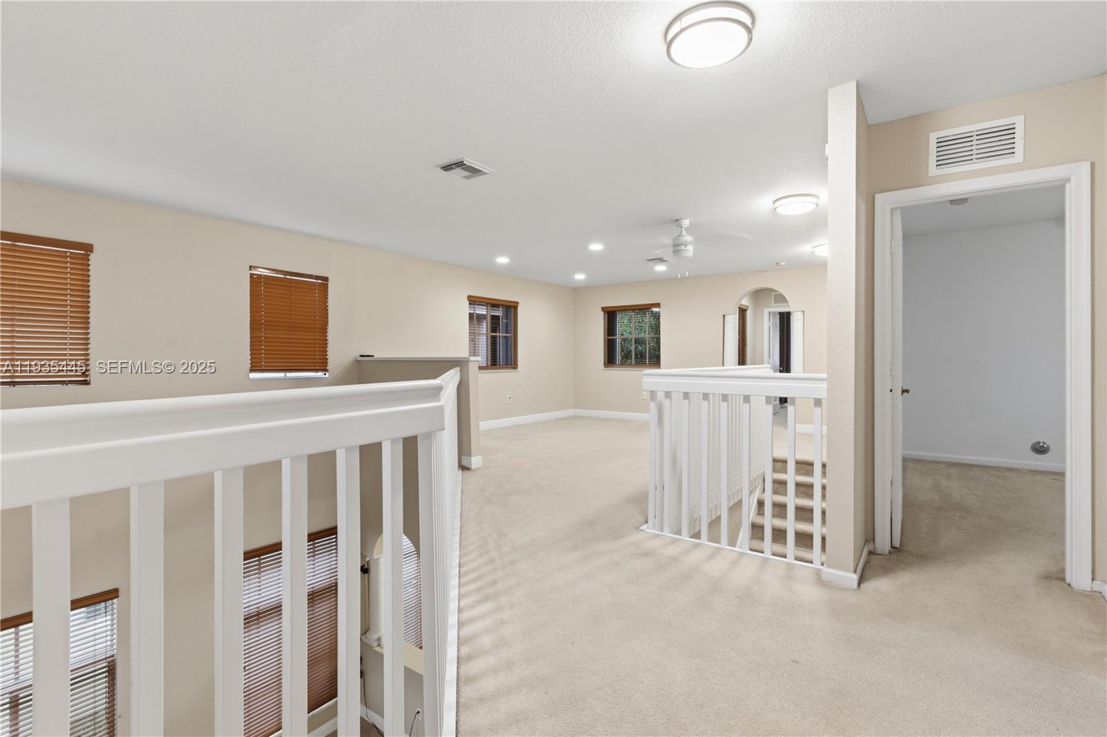 27049 Southwest 142nd Avenue Homestead, FL 33032 - Photo 13 of 36 a view of a hallway with a livingroom