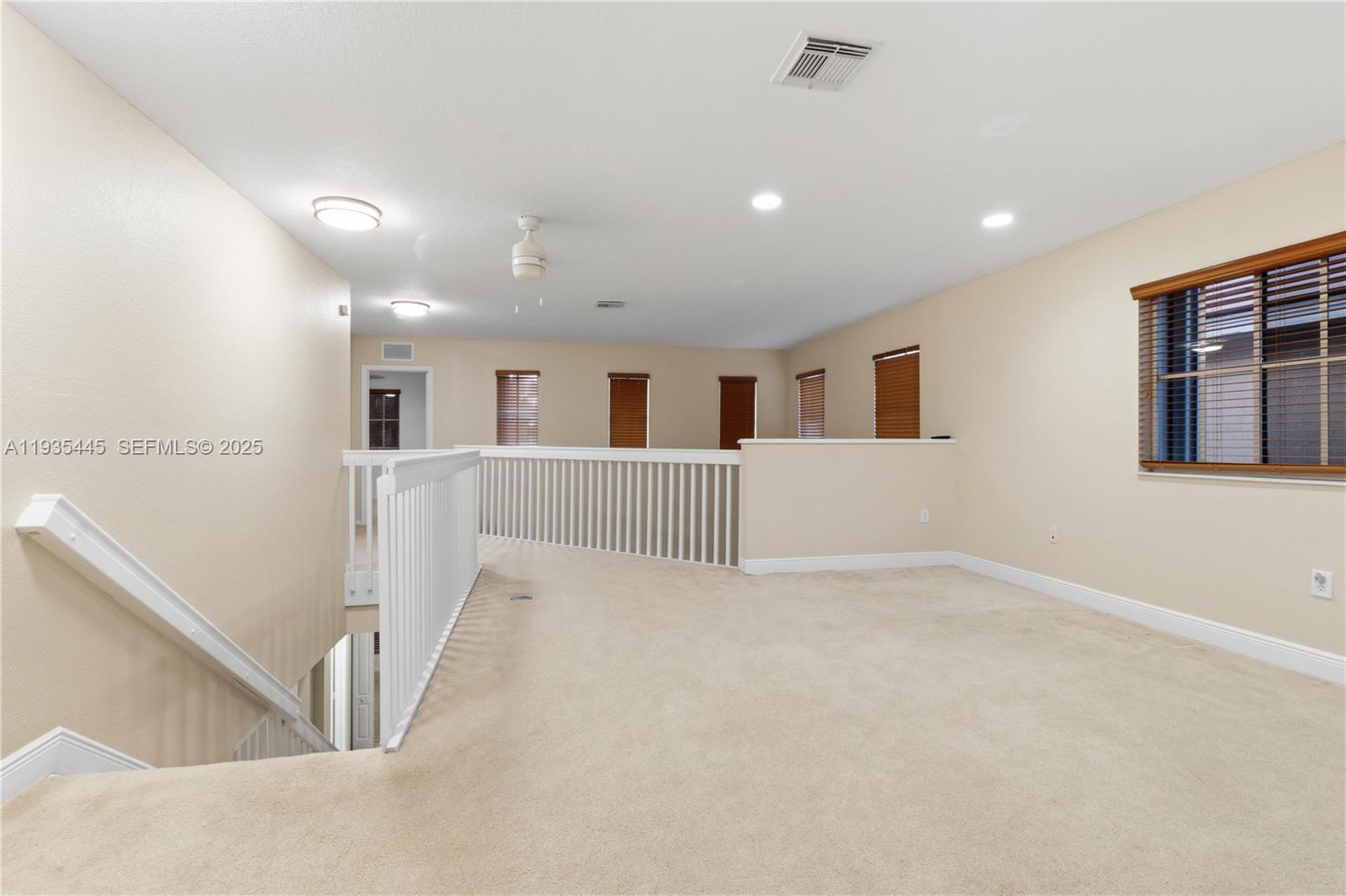 27049 Southwest 142nd Avenue Homestead, FL 33032 - Photo 14 of 36 a view of an empty room with a window