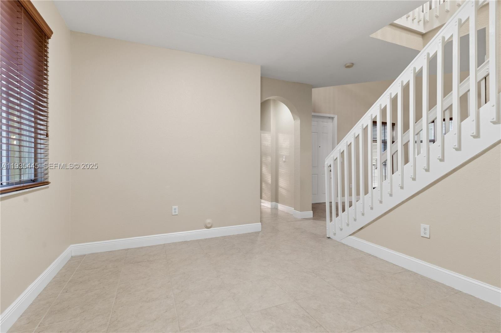 27049 Southwest 142nd Avenue Homestead, FL 33032 - Photo 18 of 36 a view of an entryway with staircase