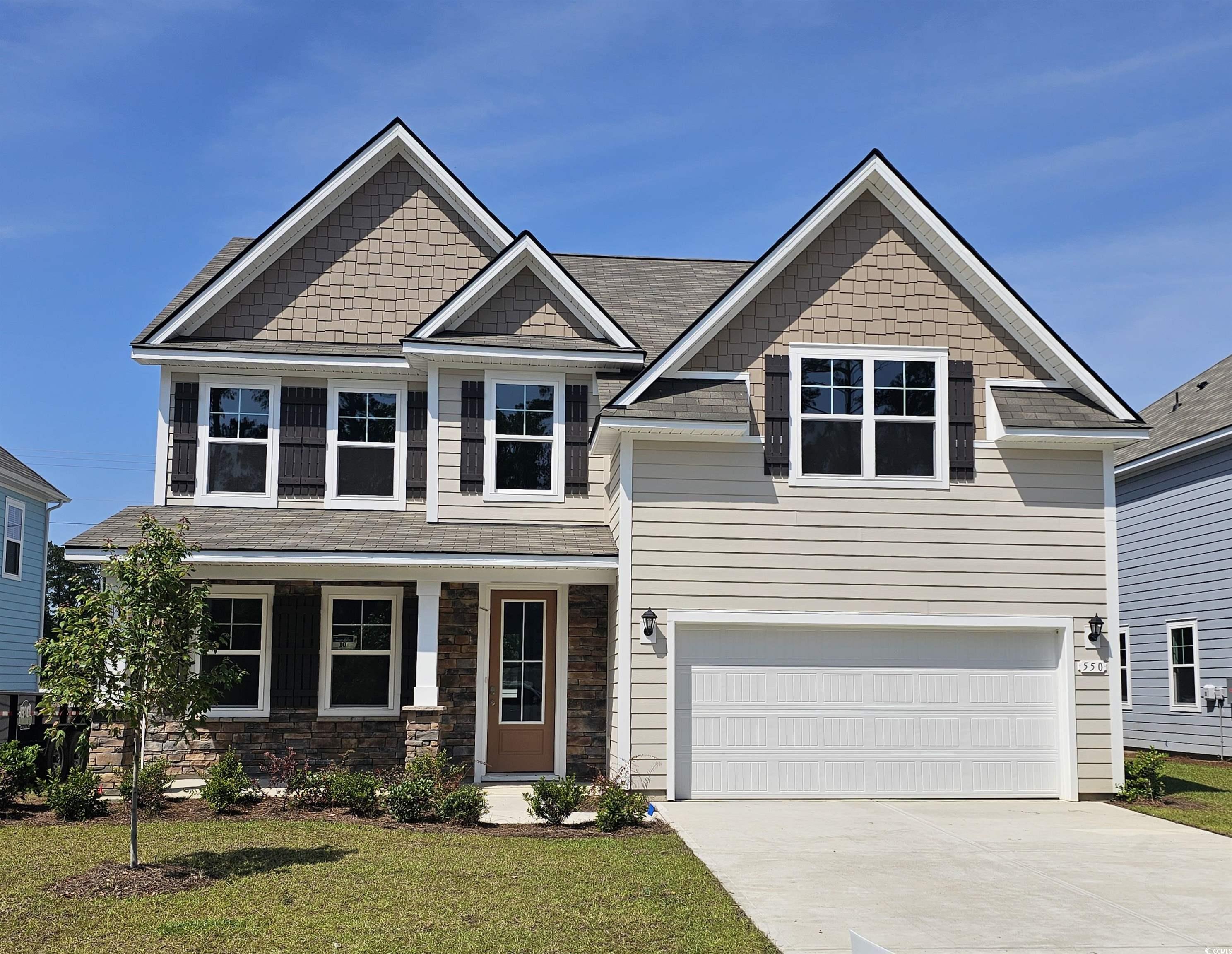 550 Haven View Way Murrells Inlet, SC 29576 - Photo 1 of 26 Craftsman-style home with a garage, driveway, and