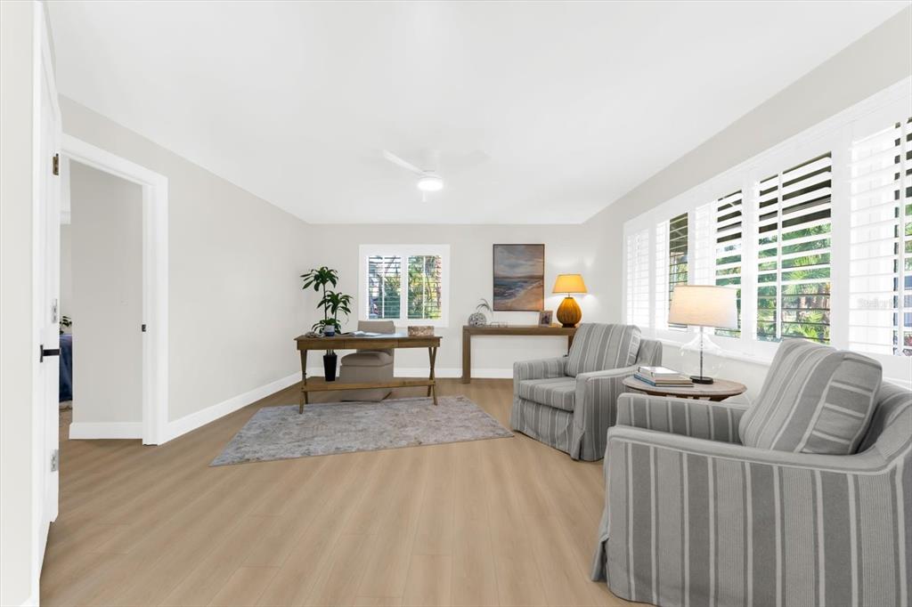 16895 1st Street East North Redington Beach, FL 33708 - Photo 30 of 96 a living room with furniture and a couch